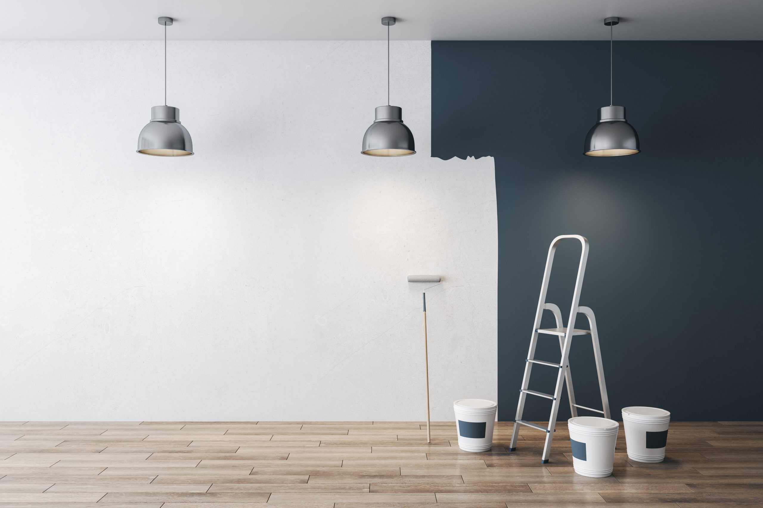 A room being painted half white and half dark blue, with a ladder, paint buckets, and a roller under pendant lights—an example where interior painting mistakes can be avoided with the right tools and techniques.